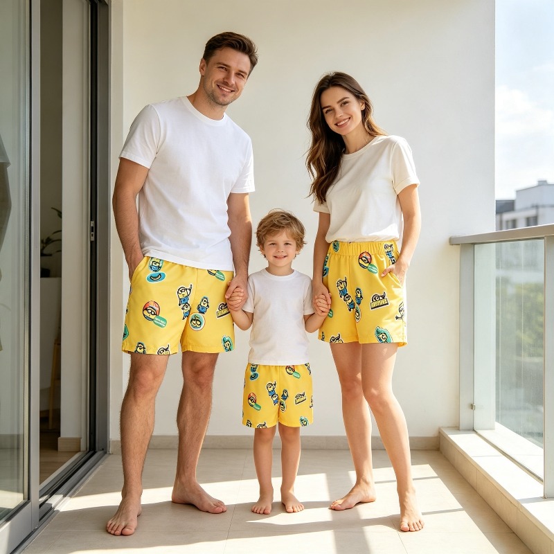 Trunks Board Surf - Chłopięce szorty kąpielowe z nadrukiem Minionków,